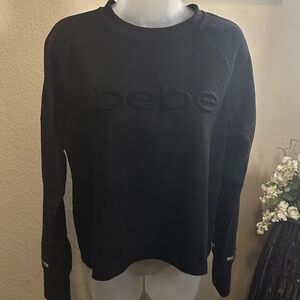 bebe Black cropped Sweater size large